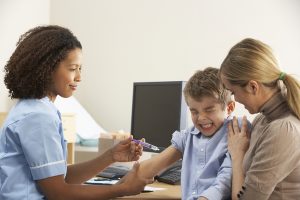 boy getting pertussis vaccine